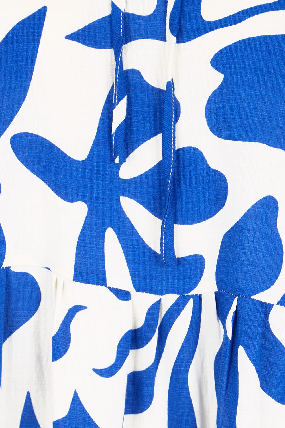 Product shot of the Tier Garden Dress – Blue in colour Blue, showing detail