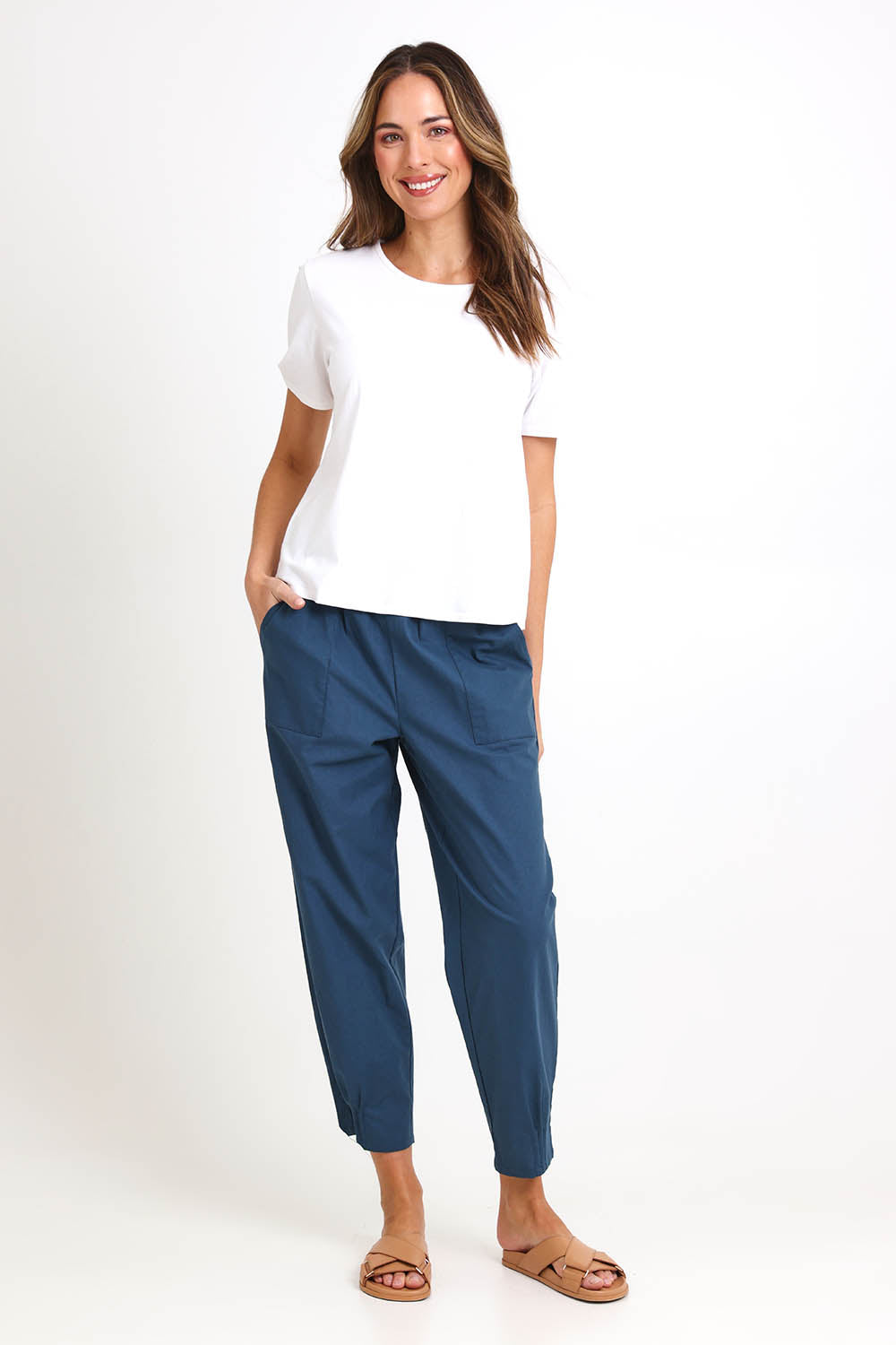 Model Madelinec wearing size 10 of the Cotton Linen Comfort Pant – Ink in colour Ink, from the front