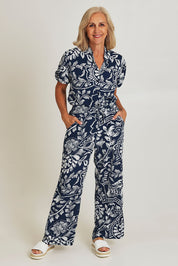 Model Sandy wearing size 10 of the Loose Fit Pant in colour Navywhite (Blue), from the front, showing the whole outfit