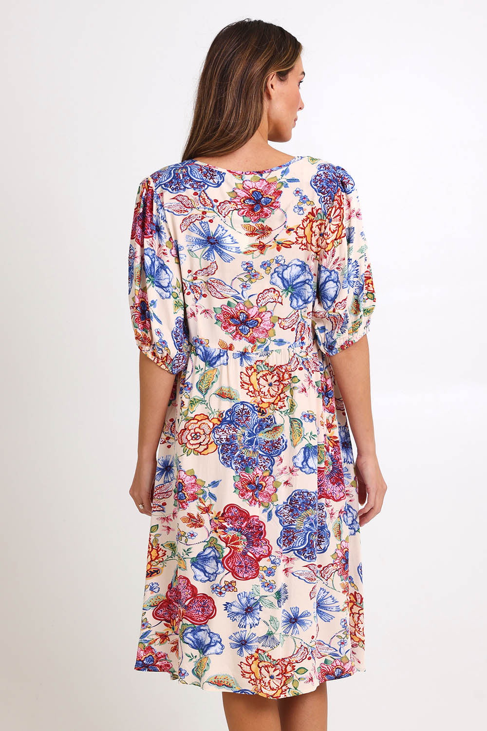 Model Madelinec wearing size 10 of the Billow Pocket Print Dress – Ivory in colour Ivory, from the back