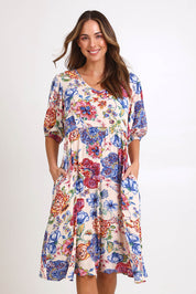 Model Madelinec wearing size 10 of the Billow Pocket Print Dress – Ivory in colour Ivory, in a cropped view