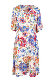 Product shot of the Billow Pocket Print Dress – Ivory in colour Ivory, from the front
