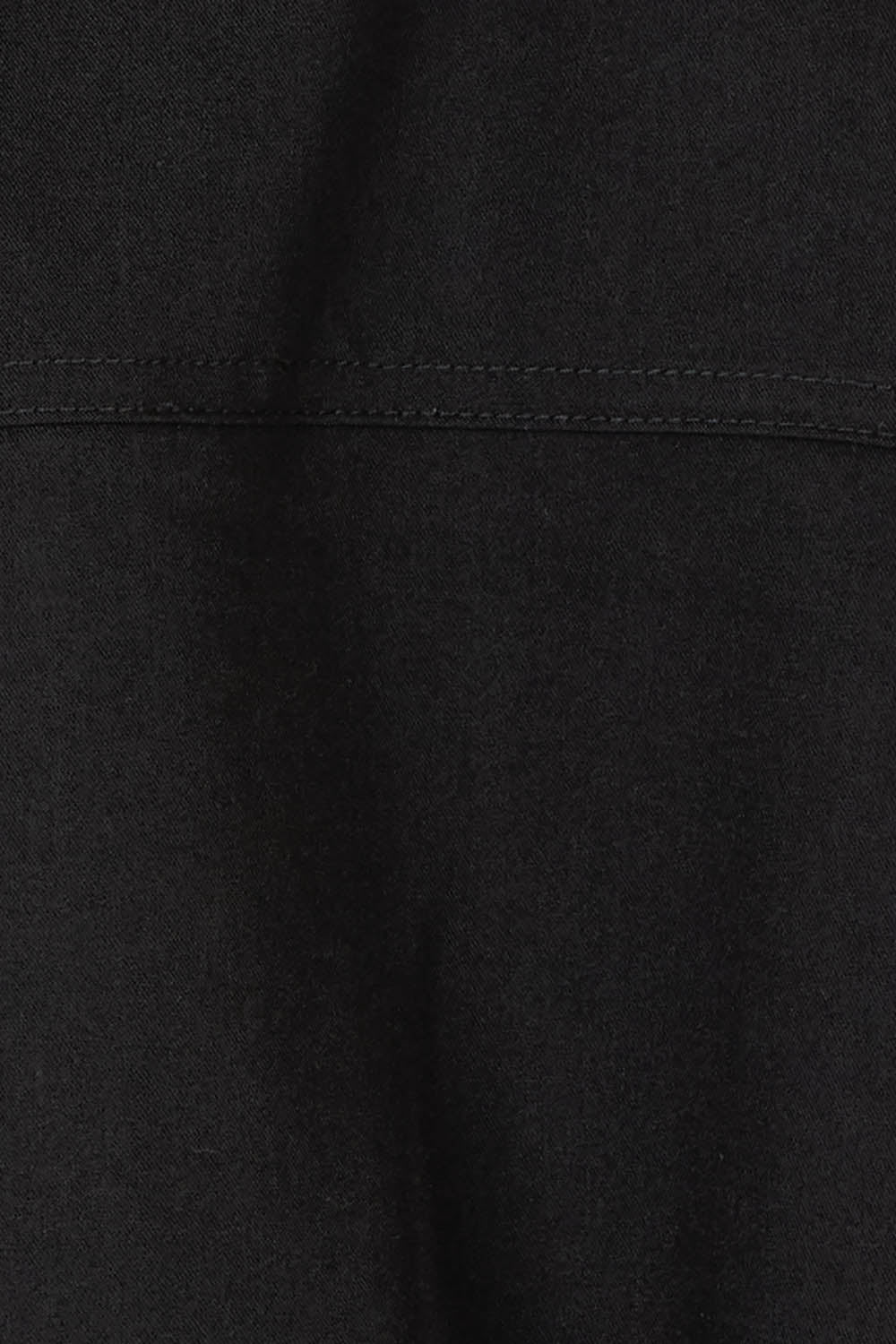 Product shot of the Soft Fluid Dress in colour Black (Black), detail