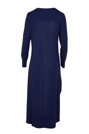 Product shot of the Long Sleeve Pocket Dress in colour Navy (Blue), from the back