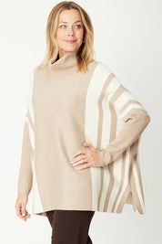 A model wearing the Stripe True Knit Pullover in colour Beigeivory, from the front, cropped image