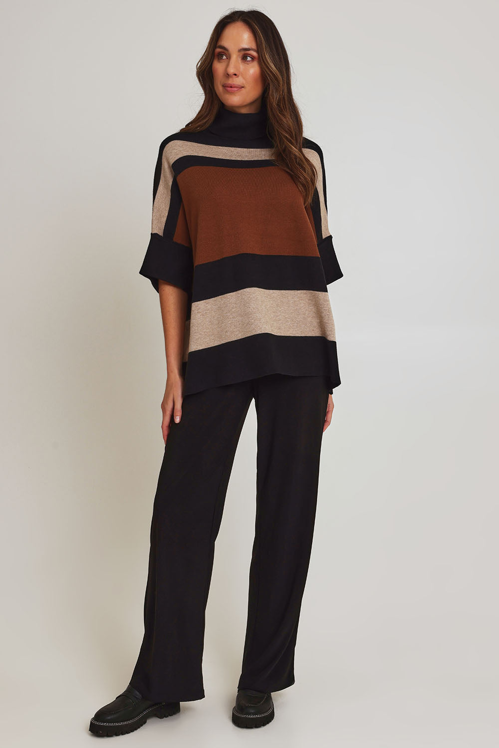 Model Madeline wearing size OneSize of the Stripe Polo Knit Pullover in colour Coffee, from the front, showing the whole outfit