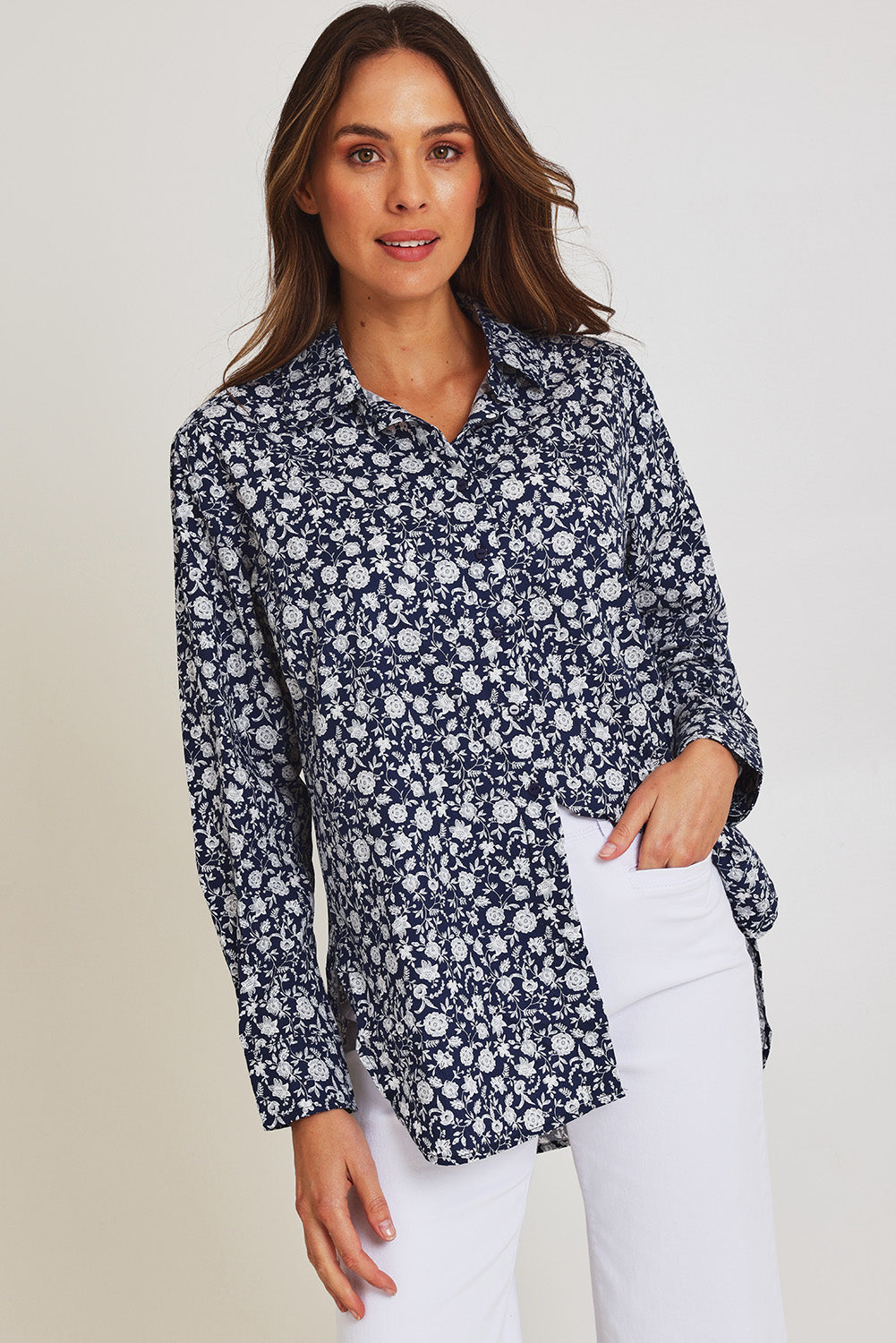 Model Madeline wearing size 10 of the Floral Scoop Cotton Shirt in colour Navywhite (Blue), from the front, cropped image