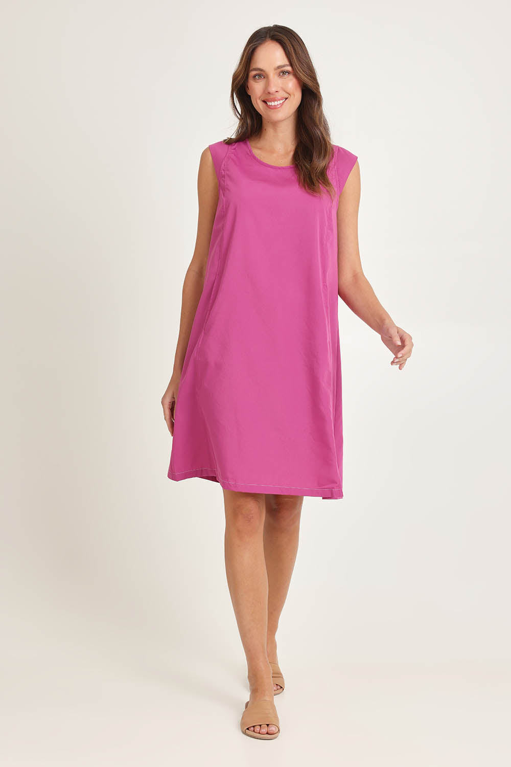 Model Madeline wearing size 10 of the Get Smart Cotton Blend Dress in colour Berry (Pink), from the front, showing the whole outfit