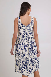 Model Madeline wearing size 10 of the Oakley Dress in colour Blue (Blue), from the back
