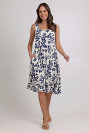 Model Madeline wearing size 10 of the Oakley Dress in colour Blue (Blue), from the front, showing the whole outfit