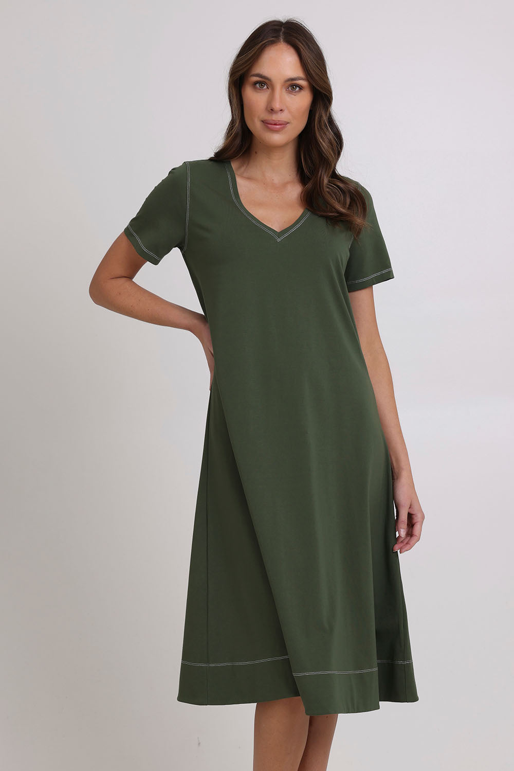 Model Madeline wearing size 10 of the Short Sleeve Contrast Dress in colour Khaki (Green), from the front, cropped image