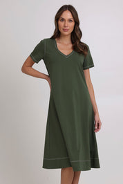 Model Madeline wearing size 10 of the Short Sleeve Contrast Dress in colour Khaki (Green), from the front, cropped image