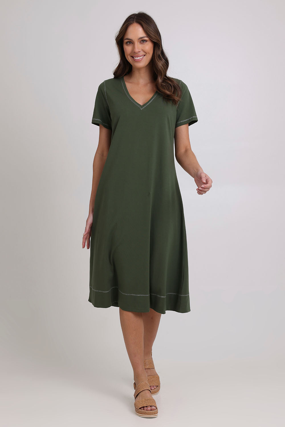 Model Madeline wearing size 10 of the Short Sleeve Contrast Dress in colour Khaki (Green), from the front, showing the whole outfit