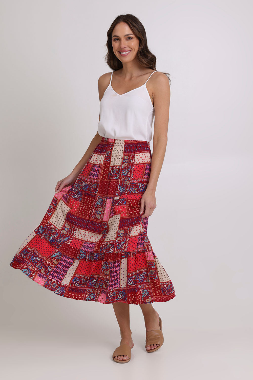 Model Madeline wearing size 10 of the Print Skirt in colour Pink (Pink), from the front, showing the whole outfit