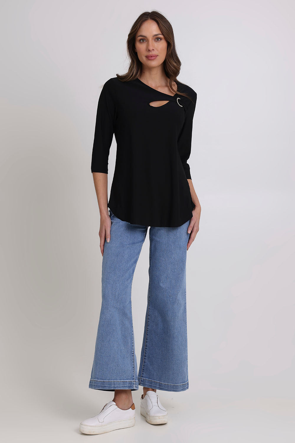 Model Madeline wearing size 10 of the Ring Top in colour Black (Black), from the front, showing the whole outfit