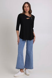 Model Madeline wearing size 10 of the Ring Top in colour Black (Black), from the front, showing the whole outfit
