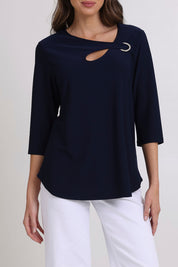 Model Madeline wearing size 10 of the Ring Top in colour Navy (Blue), from the front, cropped image