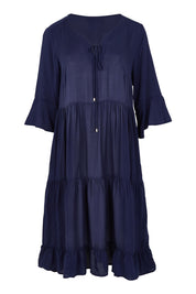 Product shot of the Jessie Dress in colour Navy (Blue), from the front