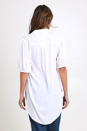 Model Madelinec wearing size 10 of the Drawstring Tunic Shirt – White in colour White, from the back