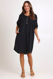 Model Madelinec wearing size 10 of the Invert Cotton Linen Blend Dress – Black in colour Black, from the front