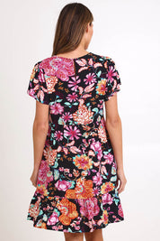 Model Madelinec wearing size 10 of the Heatwave Dress – Black in colour Black, from the back
