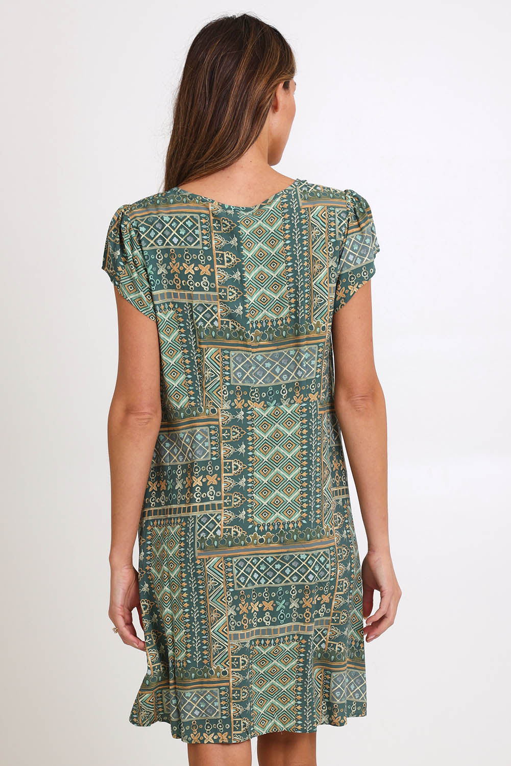 Model Madelinec wearing size 10 of the Kirra Pintuck Dress – Sage in colour Sage, from the back