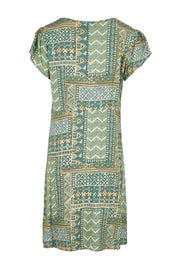 Product shot of the Kirra Pintuck Dress – Sage in colour Sage, from the back