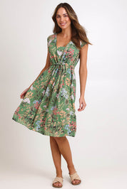Model Madelinec wearing size 10 of the Sunshine Dress – Green in colour Green, from the front
