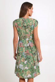 Model Madelinec wearing size 10 of the Sunshine Dress – Green in colour Green, from the front