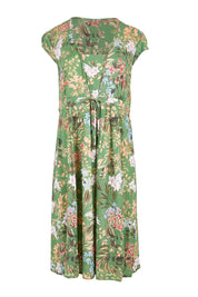 Product shot of the Sunshine Dress – Green in colour Green, from the front