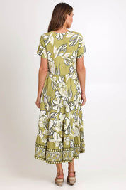 Model Madelinec wearing size 10 of the Tier Garden Dress – Lime in colour Lime, from the front