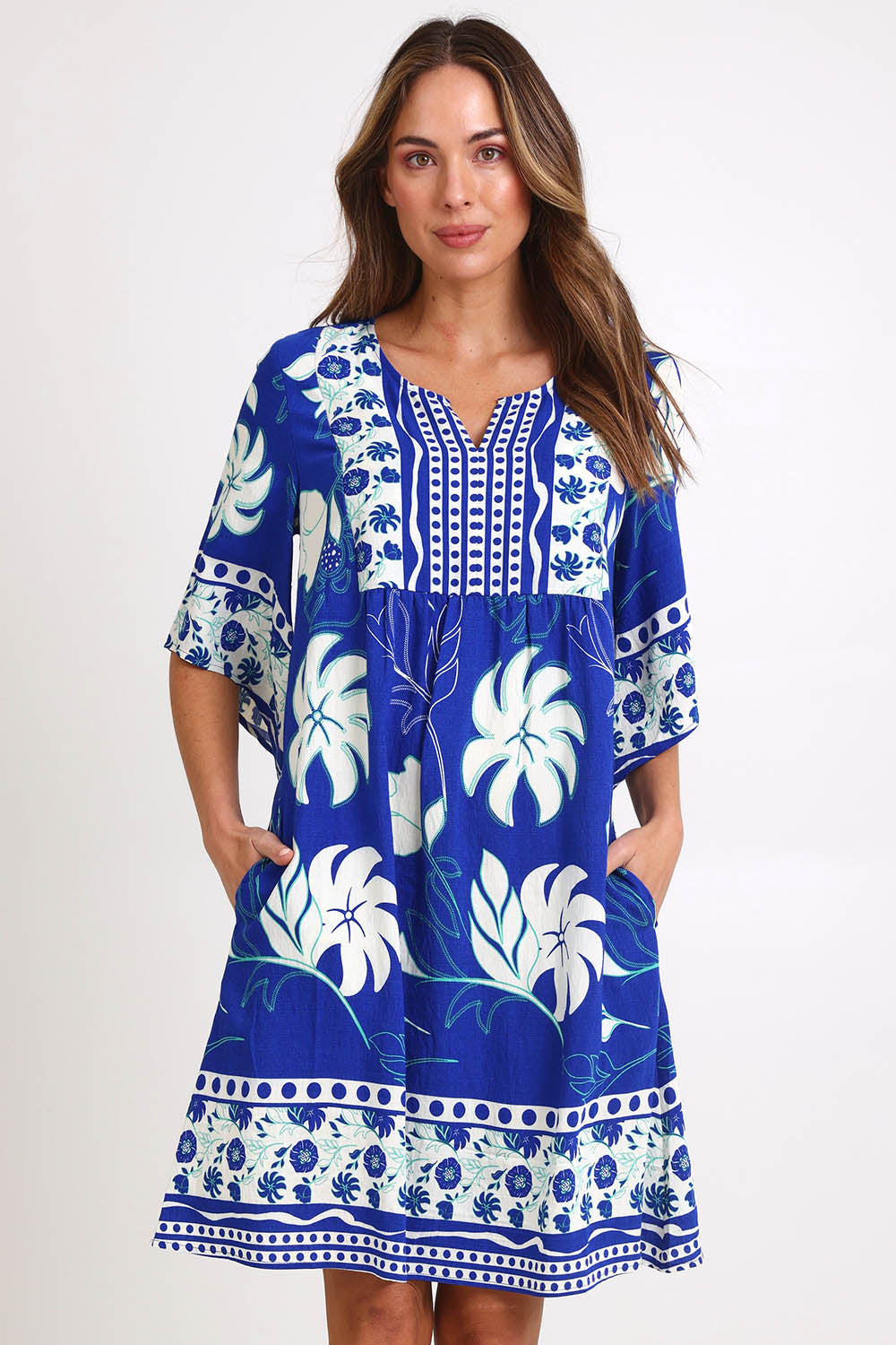 Model Madelinec wearing size 10 of the Sun Dress – Royal in colour Royal, in a cropped view