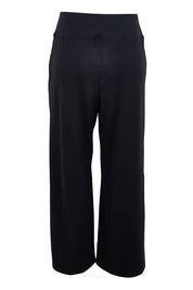 Product shot of the Walk And Work Pant – Black in colour Black, from the back