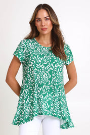 Model Madelinec wearing size 10 of the Jersey Flare Top – Green in colour Green, in a cropped view