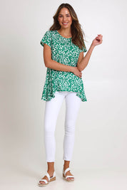 Model Madelinec wearing size 10 of the Jersey Flare Top – Green in colour Green, from the front