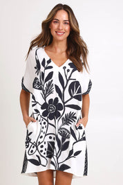 Model Madelinec wearing size 10 of the Kimono Shift Dress – Blkprint in colour Blkprint, in a cropped view