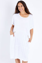 Model Larissa wearing size S-M of the Happy Petals Bounce Dress in colour White (White), from the front, cropped image