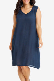 Model Laura wearing size M-L of the Periwinkle Dress Shirt Set in colour Slate (Black), from the front, cropped image