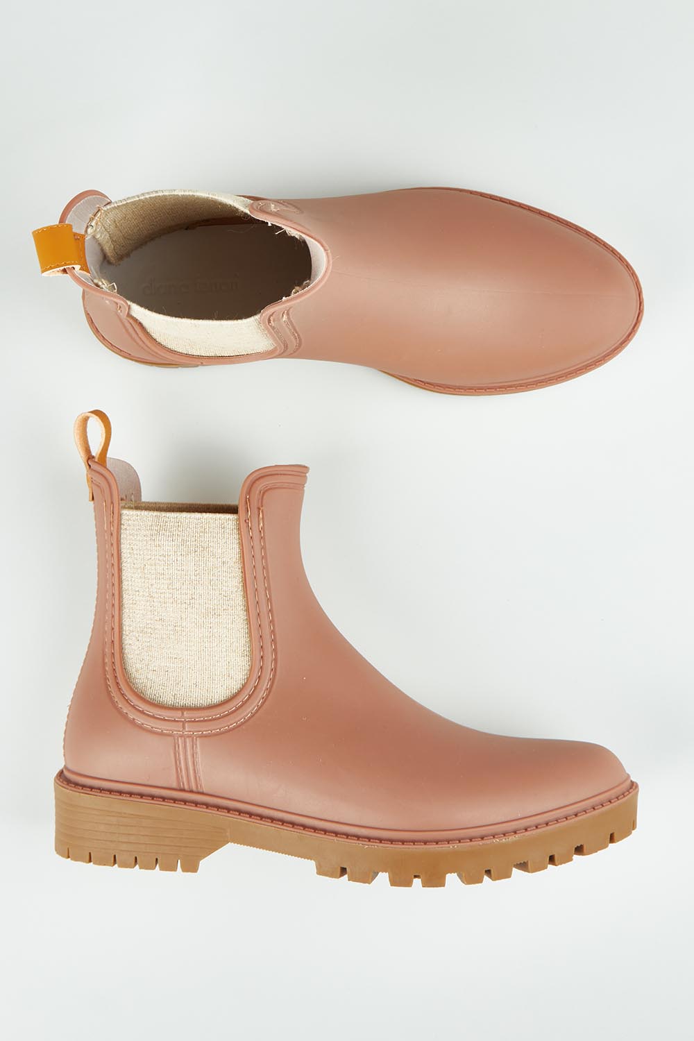 A model wearing size 37 of the Laurina2 Gumboot in colour Coffee, from the front, showing the whole outfit