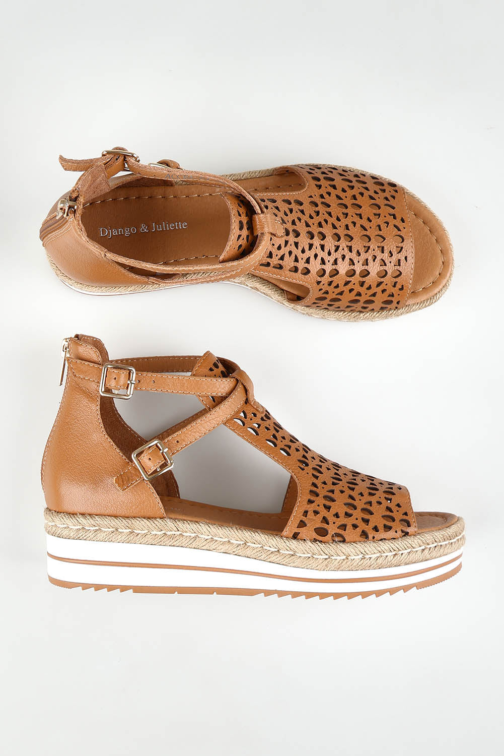 A model wearing size 37 of the Accra Leather Sandal in colour Darktan, from the front, showing the whole outfit