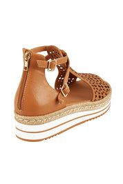 Product shot of the Accra Leather Sandal in colour Darktan, from the back