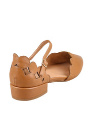 Product shot of the Ega Leather Sandal in colour Darktan, from the back