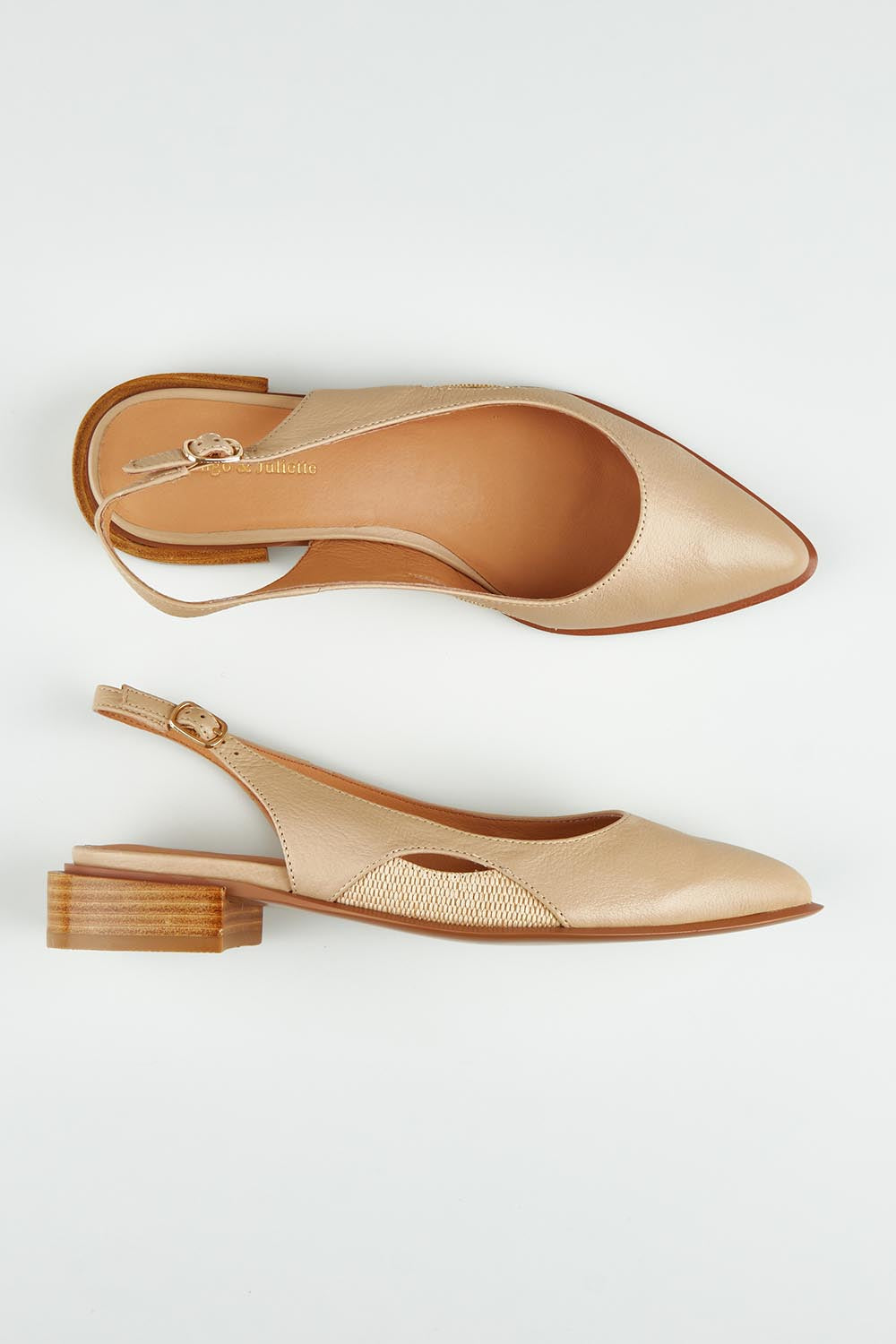 A model wearing size 37 of the Equip Leather Flat in colour Camel, from the front, showing the whole outfit