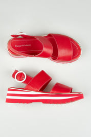 A model wearing size 37 of the Hecon Leather Flatform in colour Red (Red), from the front, showing the whole outfit