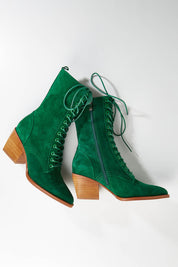 A model wearing size 37 of the Major Suede Lace Up Boot in colour Dkemerald (Green), from the front, showing the whole outfit