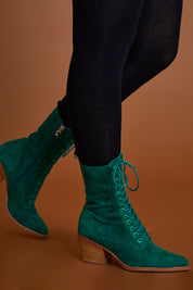 A model wearing size 40 of the Major Suede Lace Up Boot in colour Dkemerald (Green), from the front, cropped image