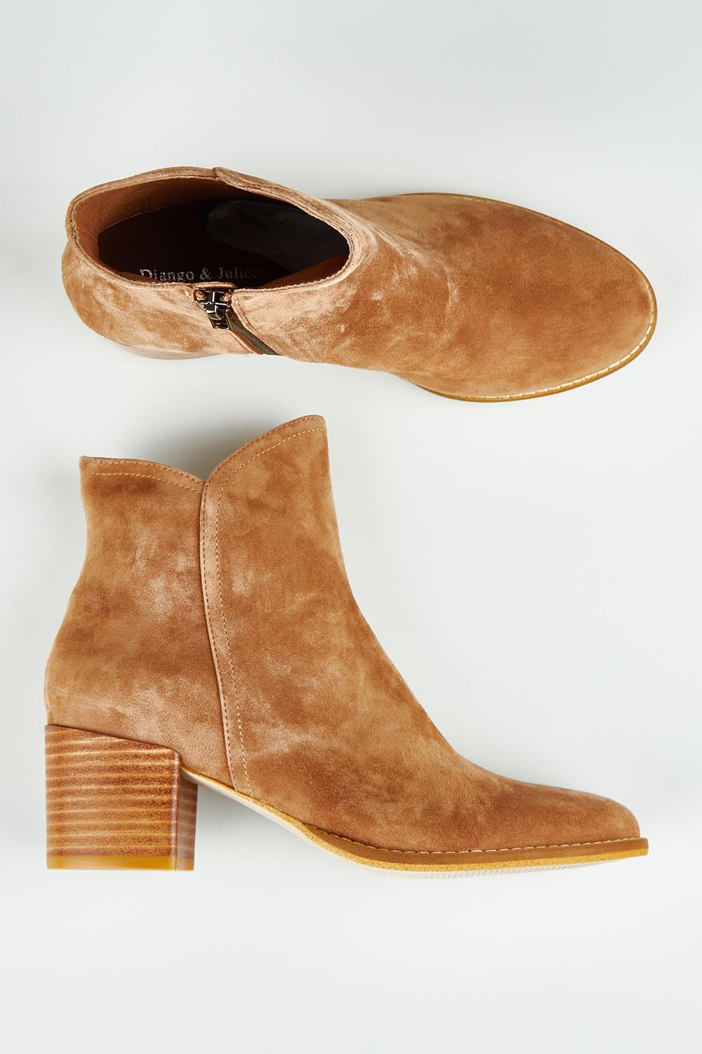 A model wearing size 37 of the Mockas Ankle Boot in colour Whisky, from the front, showing the whole outfit
