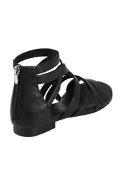Product shot of the Pillish Leather Flat Sandal in colour Black (Black), from the back