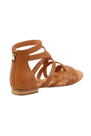 Product shot of the Pillish Leather Flat Sandal in colour Tan, from the back