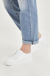 A model wearing size 38 of the Shia Leather Pull On Sneaker in colour Whitewhite (White), from the front, cropped image